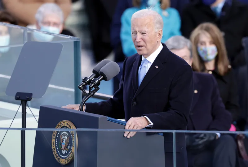 Biden takes office with call to end 'uncivil war'