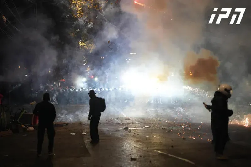 After the use of tear gas canisters by riot police, the protesters leave Rustaveli Avenue, but eventually return