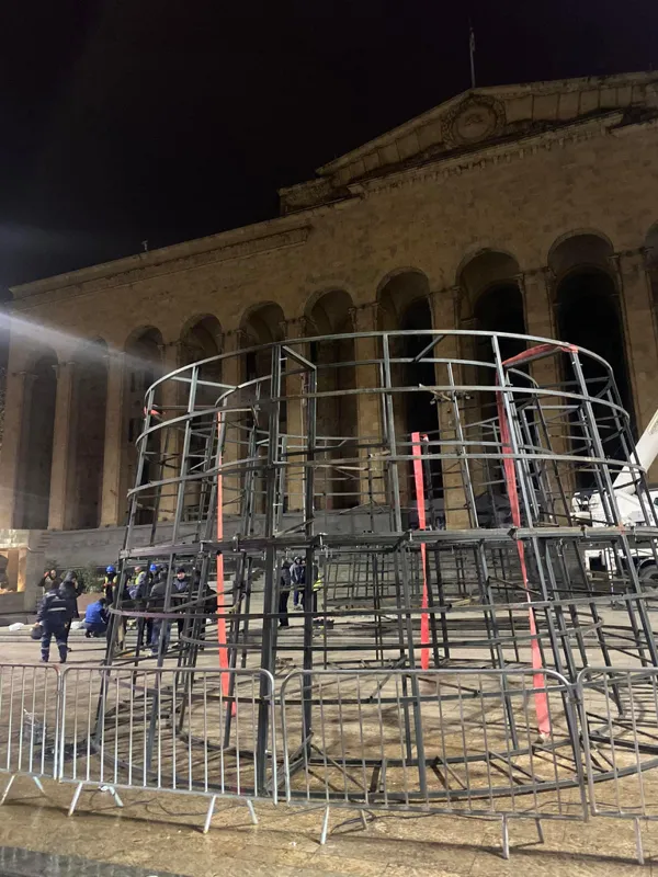 They are putting up a Christmas tree in front of the Parliament building
