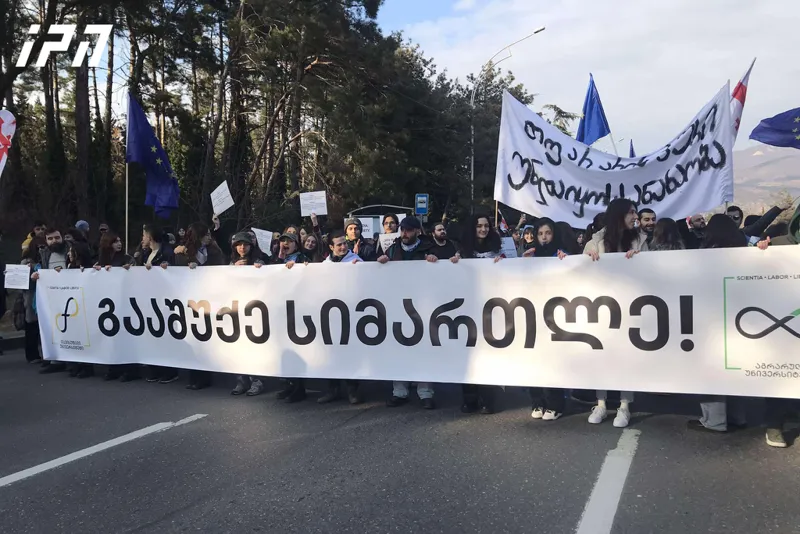 Students and lecturers of Free and Agrarian Universities holding protest march