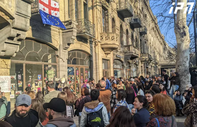 Students gathered at the Theatre University announce a defiance protest