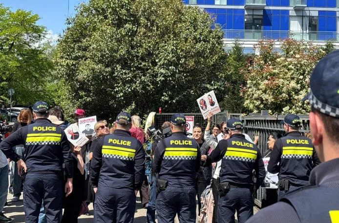 Parents of persons arrested during protests holding a rally near High School of Justice, where a conference of judges is to be held
