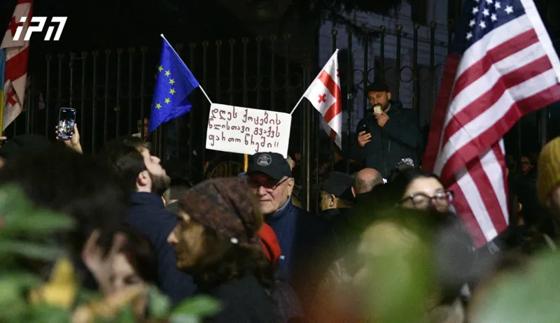 Protesters marching from Tbilisi State University towards Parliament