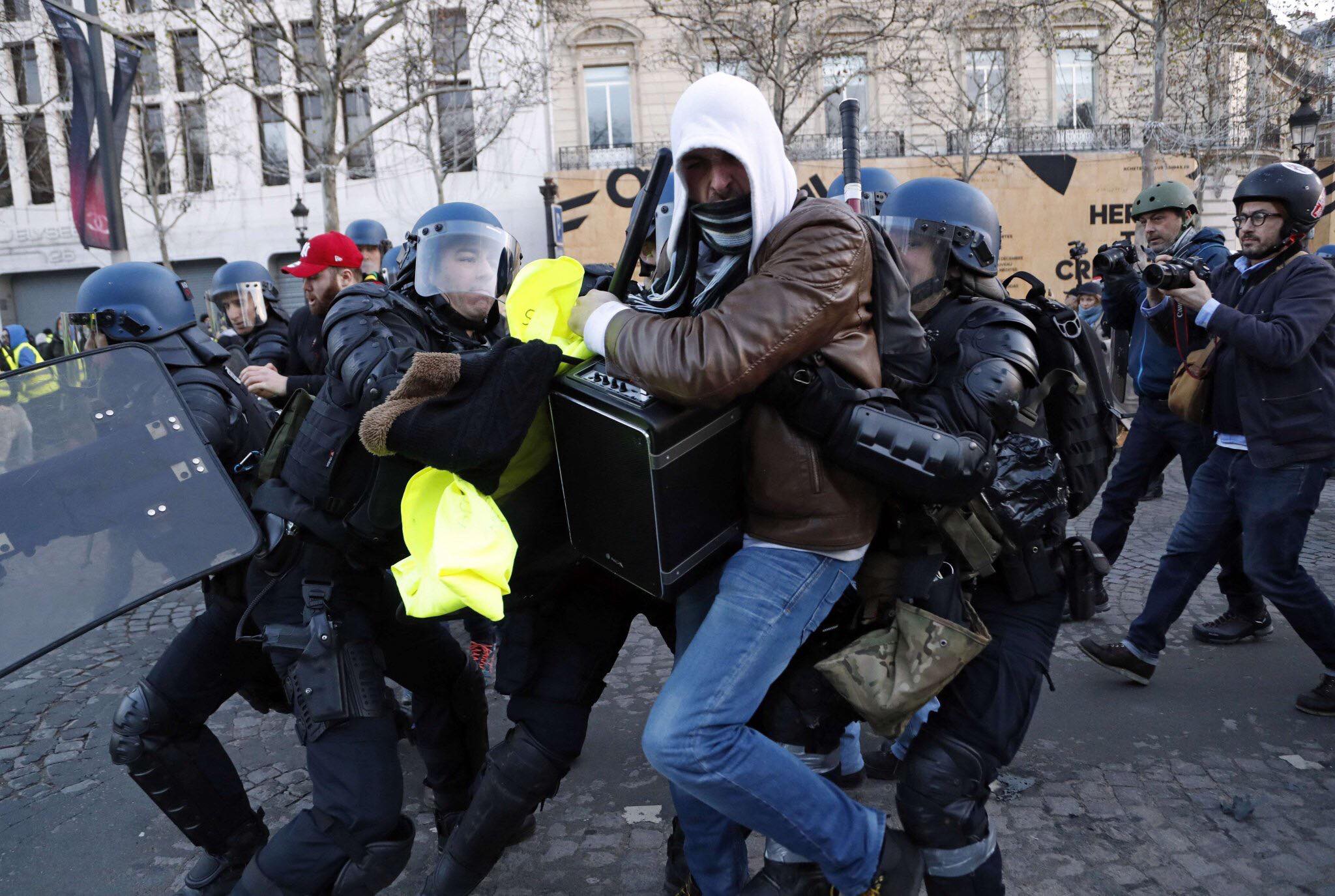 Police use tear gas, arrest 272 in Paris