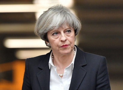 Theresa May keeps PM job