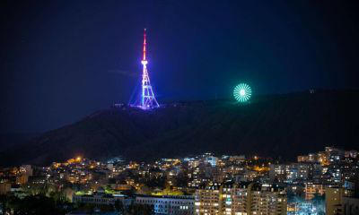 Tbilisi TV tower lit up in colors of British flag
