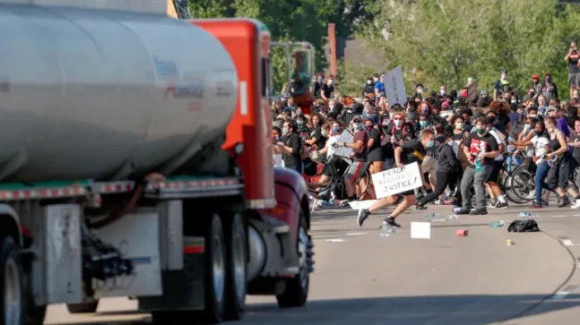 Mass protests and mayhem continue into a sixth night