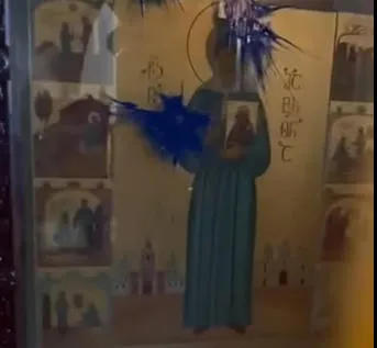 Paint splashed onto Holy Matrona icon, on which Joseph Stalin is depicted