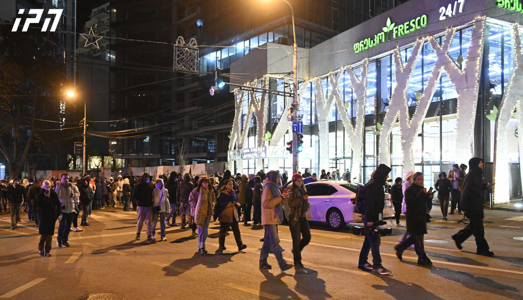 Protesters, who gathered near the "Georgian Dream" office, march towards Rustaveli Ave