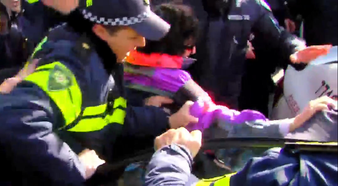 There is a confrontation between the protesters and the police on Rustaveli Avenue, and several individuals have been detained