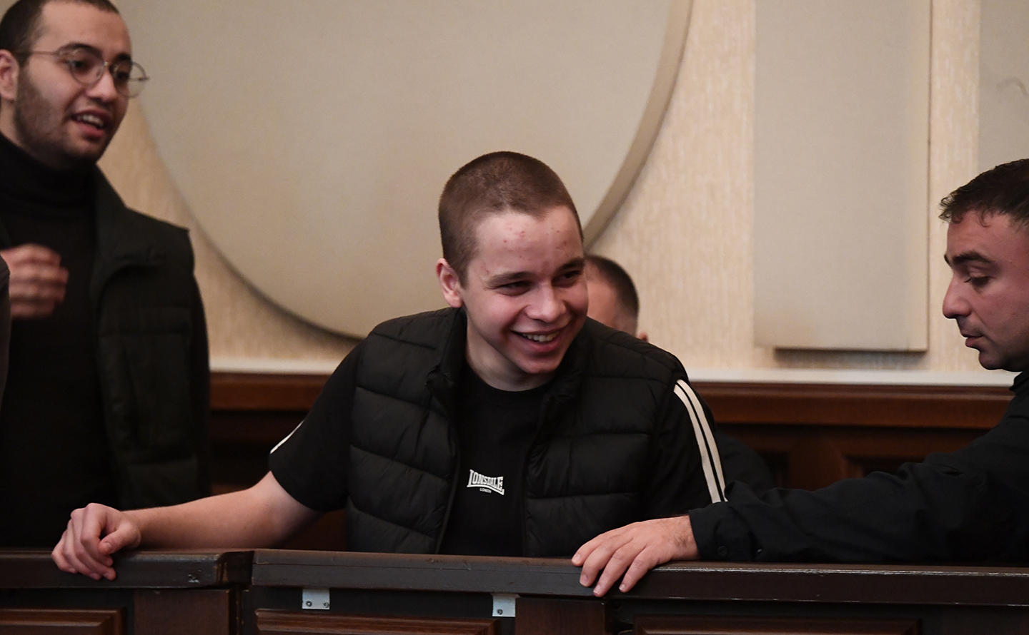Giorgi Gorgadze, arrested on charges of participating in group violence during protests, faints during trial