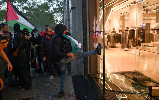 ბარსელონაში პალესტინის მხარდამჭერ აქციაზე 8 ადამიანი დააკავეს და 20 პოლიციელი დაშავდა