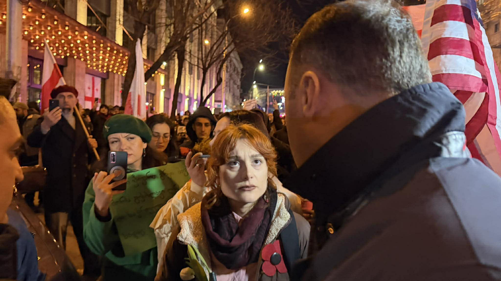 Verbal confrontation occurs between protesters and police